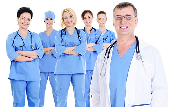 Group of urology professionals in clinical attire, highlighting team-based care