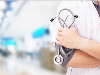 Urology medical professional holding a stethoscope, representing expert care